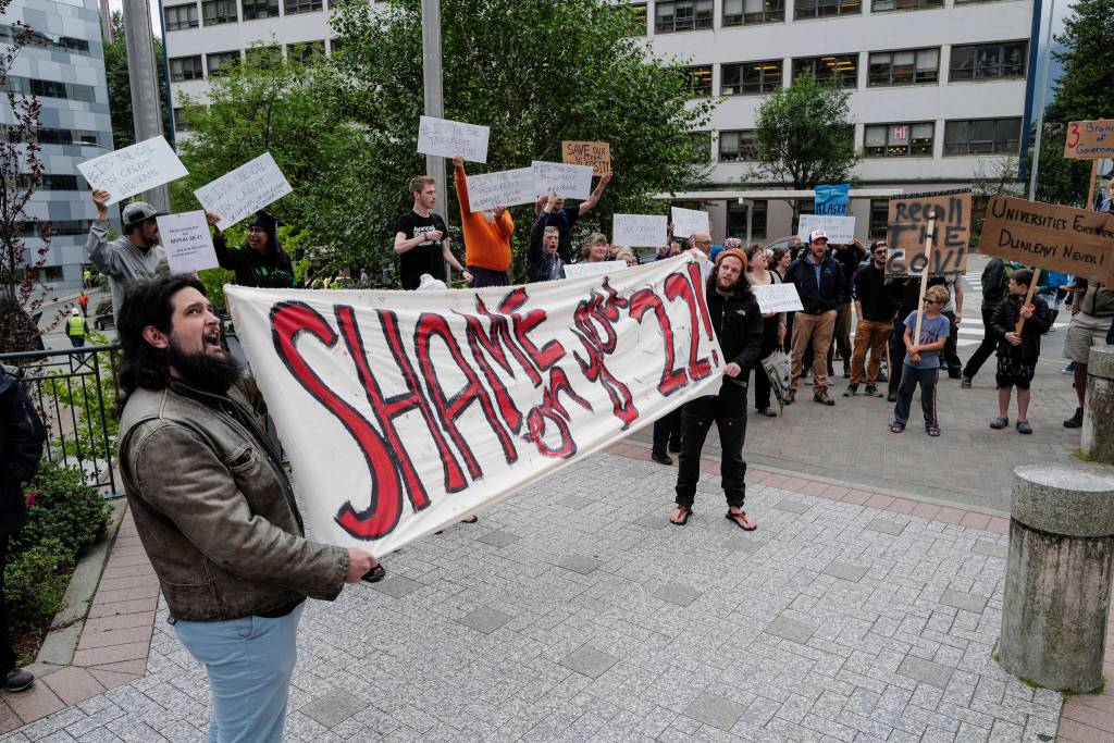 Over hundred people march from the Capitol to the Governors Mansion during a rally to protest budget vetoes by Gov. Mike Dunleavy on Friday, July 12, 2019. (Michael Penn | Juneau Empire)