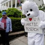 Over hundred people march from the Capitol to the Governors Mansion during a rally to protest budget vetoes by Gov. Mike Dunleavy on Friday, July 12, 2019. (Michael Penn | Juneau Empire)