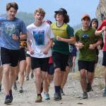 A pack runners head up the beginning of Perseverence Trail for a time trial one on the second to last day of the Lynn Canal Running Camp. (Nolin Ainsworth | Juneau Empire)