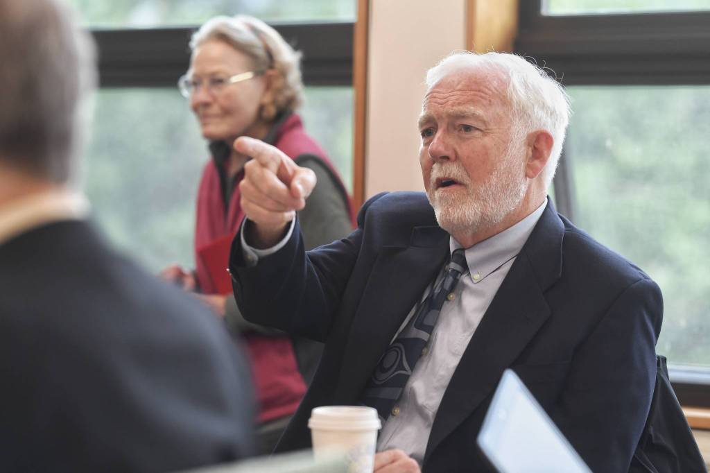 Dr. Richard Caulfield, Chancellor at the University of Alaska Southeast, watches an online meeting being held at UA campuses around the state on Gov. Mike Dunleavys budget cuts on Monday, July 15, 2019. (Michael Penn | Juneau Empire)