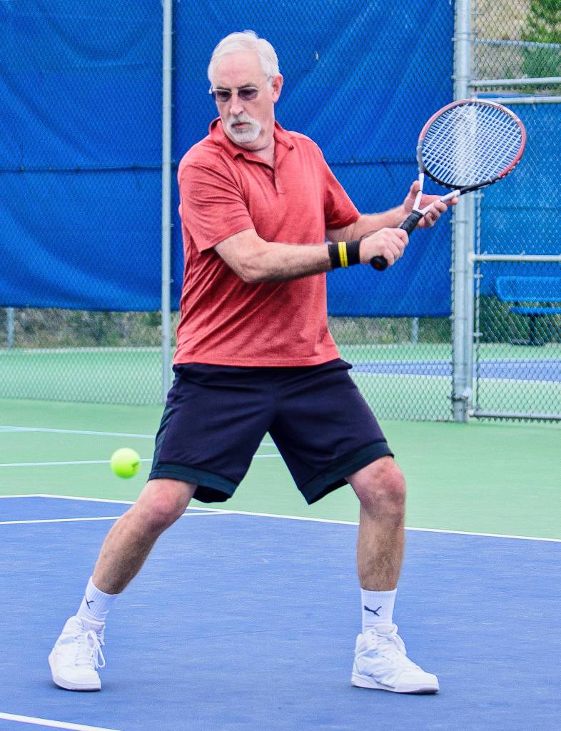 Kim Mahar of Juneau returns the ball during the Capital Cup at the Mount McIntyre Courts in Whitehorse, Yukon, on Sunday, July 14, 2019. (Courtesy Photo | Dennis Senger)