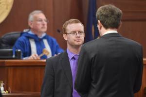 Rep. David Eastman, R-Wasilla, center, speaks with House Minority Leader Lance Pruitt, R-Anchorage, as Speaker of the House Bryce Edgmon, I-Dillingham, prepares to gavel into session at the Capitol on Friday, July 19, 2019. (Michael Penn | Juneau Empire)