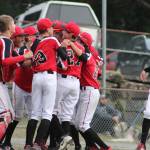 The Juneau All-Stars celebrate their Alaska Little League Junior Baseball State and District 2 championship at Norman Walker Field in Ketchikan on Friday, July 19, 2019. Juneau won 6-4 to sweep the best-of-five state tournament series and advance to the Junior Baseball West Region Tournament in San Jose, California, July 26- Aug. 3. (Courtesy Photo | Lori Crupi)