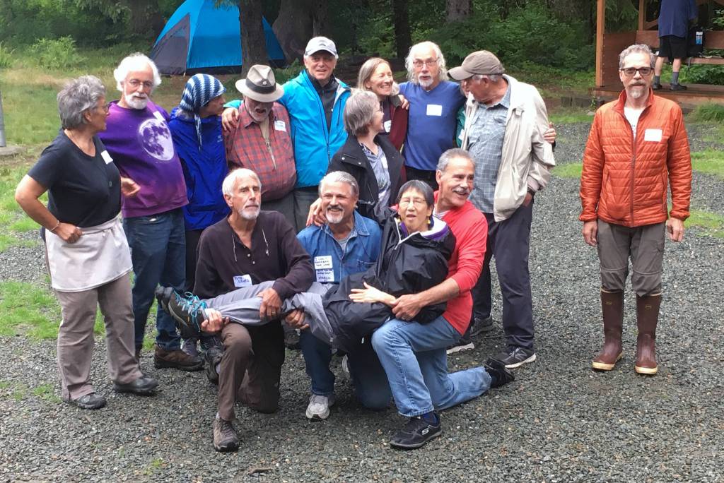 Former staff of the False Island Young Adult Conservation Corps pose for a picture during the groups reunion Friday, July 19, 2019, at the Eagle River United Methodist Camp in Juneau. The camps former director, Lisa Louie, is pictured in the front row. (Michael S. Lockett | Juneau Empire)