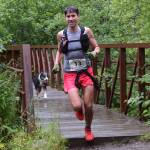 Allan Spangler runs across Gold Creek on Perseverance Trail while competing in the Juneau Ridge Race at Cope Park on Saturday, July 20, 2019. Over 60 runners participated in the 15-mile mountain running race that featured approximately 5,000 feet of elevation gain. (Nolin Ainsworth | Juneau Empire)