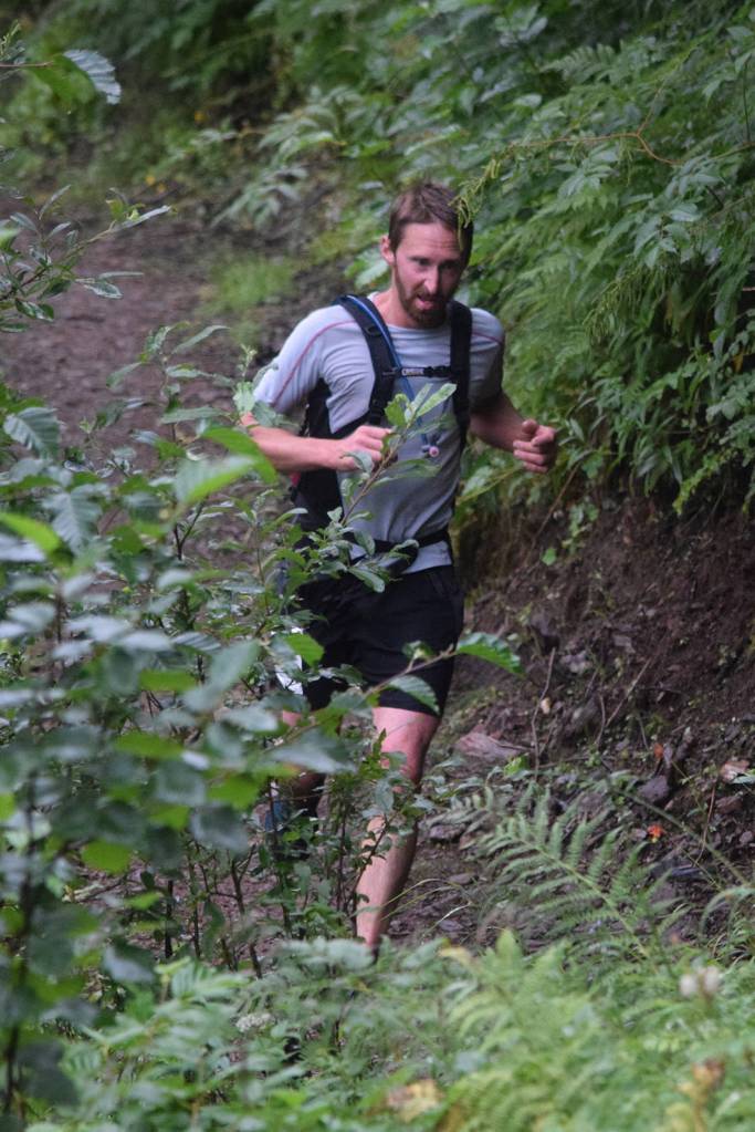 Justin Fantasia descends from Mount Juneau along the Granite Creek Trail while competing in the Juneau Ridge Race on Saturday, July 20, 2019. Over 60 runners participated in the 15-mile mountain running race that featured approximately 5,000 feet of elevation gain. (Nolin Ainsworth | Juneau Empire)