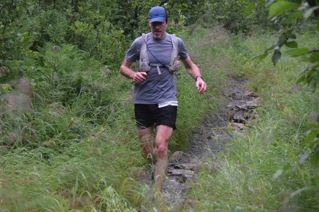 Franz Mueter descends from Mount Juneau along Granite Creek Trail while competing in the Juneau Ridge Race on Saturday, July 20, 2019. Over 60 runners participated in the 15-mile mountain running race that featured approximately 5,000 feet of elevation gain. (Nolin Ainsworth | Juneau Empire)
