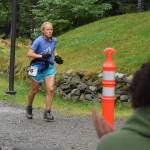 Barbara Baysinger completes the Juneau Ridge Race at Cope Park on Saturday, July 20, 2019. Over 60 runners participated in the 15-mile mountain running race that featured approximately 5,000 feet of elevation gain, including around 20 women. (Nolin Ainsworth | Juneau Empire)
