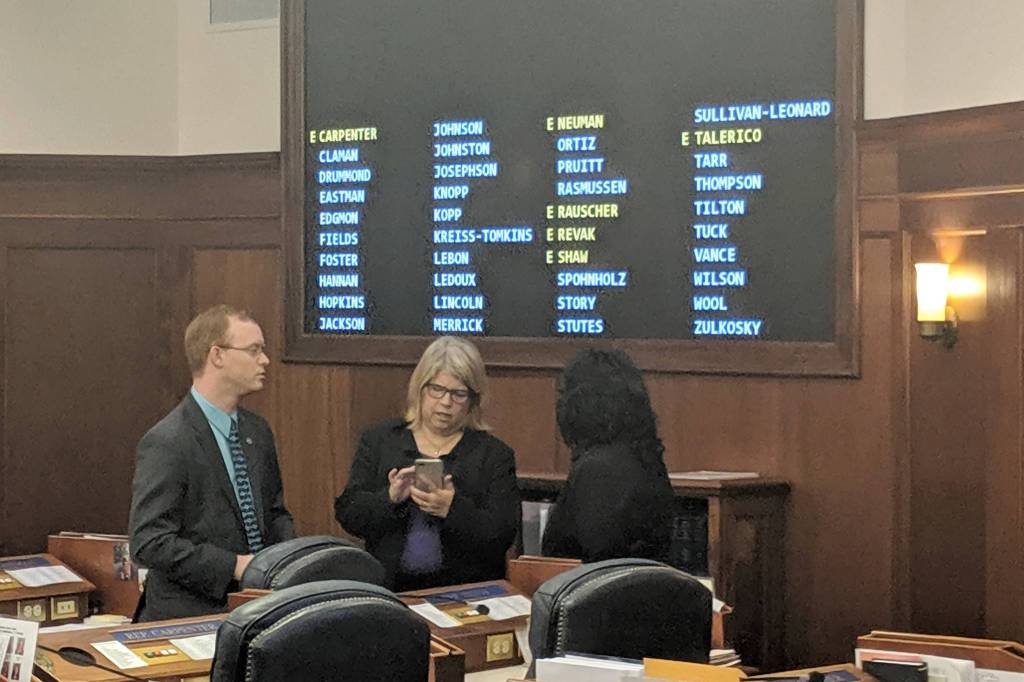Reps. David Eastman, R-Wasilla; Tammie Wilson, R-North Pole; and Cathy Tilton, R-Wasilla; meet before the House floor session Sunday, July 21,2019. (Ben Hohenstatt | Juneau Empire)
