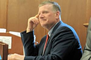 Rep. Chuck Kopp, R-Anchorage, listens during a House floor session Sunday, July 21, 2019. (Ben Hohenstatt | Juneau Empire)