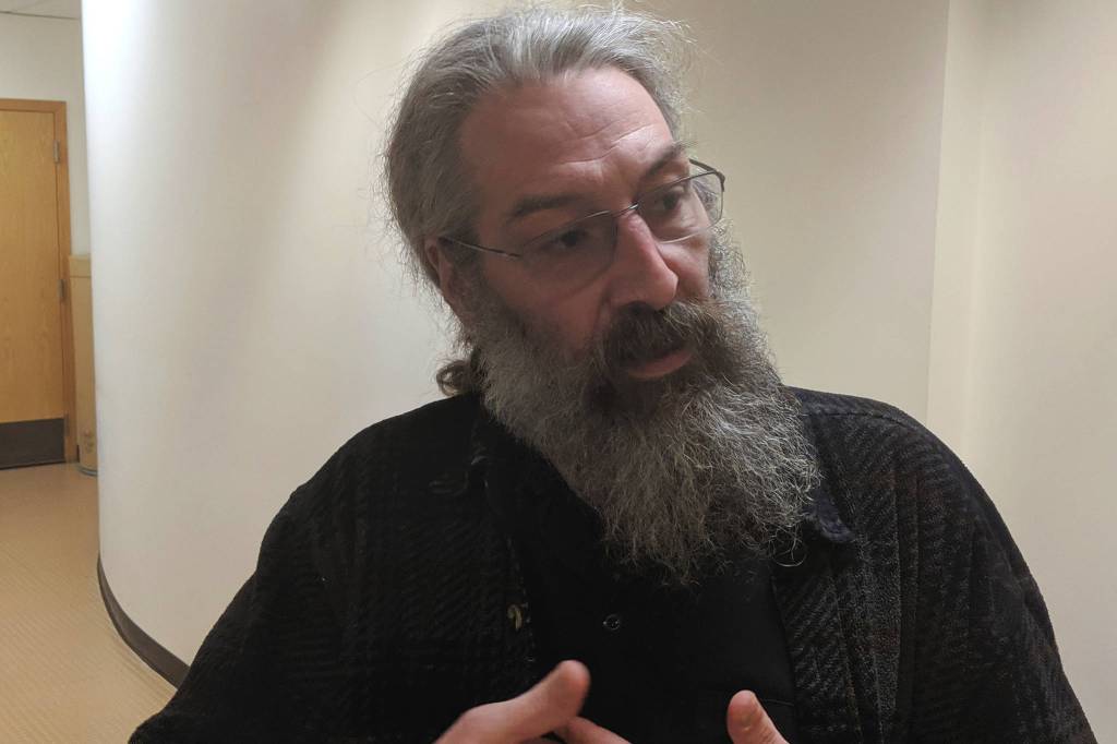 Ben Wilcox, co-owner of THC Alaska, speaks outside the City and Borough of Juneau Assembly Chambers, June 24, 2019. (Ben Hohenstatt | Juneau Empire)