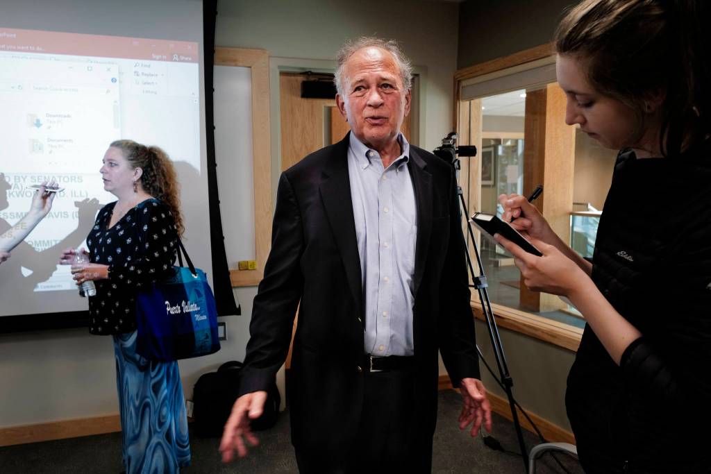 Dan Press, of Van Ness Feldman LLP in Washington, D.C., center, and Brenda Thayer, a mental health counselor for SEARHC, left, answer questions after giving speeches about trauma in Native communities at the Walter Soboleff Center on Tuesday, July 23, 2019. (Michael Penn | Juneau Empire)
