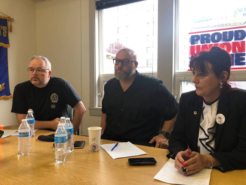 From left to right: Robb Arnorld, John Fageaux, IBU President Marina Secchitano, at the IBU office in Juneau on Wednesday, July 24, 2019. (Peter Segall|Juneau Empire)