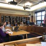 Erin Shine, in white, from Rep. Jennifer Johnstons staff, and Amanda Ryder, in blue, from the Legislative Finance Division give testimony to the House Finance Committee on House Bill 2003 on Thursday, July 25, 2019. (Peter Segall | Juneau Empire)