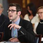 how the office performs sweeps of unspent money in various government accounts during a Senate Finance meeting at the Capitol on Thursday, July 18, 2019. Donna Arduin, Director of the Office of Management and Budget, right, watches in the background. (Michael Penn | Juneau Empire)