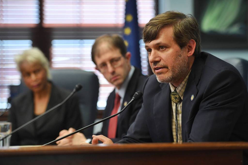Sen. Bill Wielechowski, D-Anchorage, right, speaks as Sen. Jesse Kiehl, D-Anchorage, center, and Sen. Elvi Gray-Jackson, D-Anchorage, listen during a Senate Minority Caucus press conference after the Senate passed the operating budget at the Capitol on Monday, July 29, 2019 (Michael Penn | Juneau Empire)