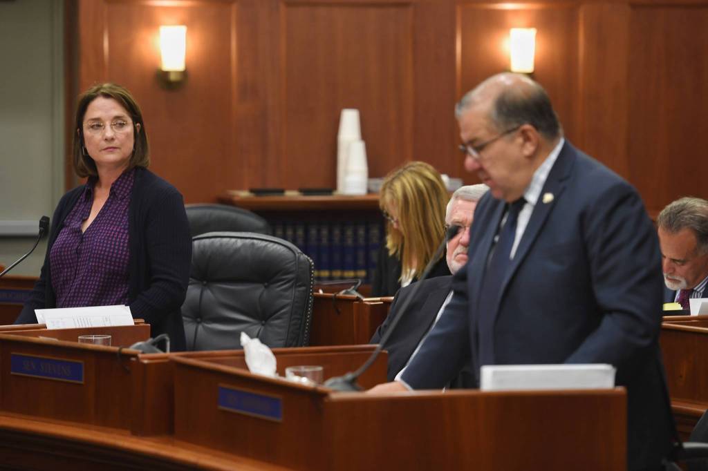 Sen. Lora Reinbold, R-Eagle River, watches as Senate Majority Leader Lyman Hoffman, R-Bethel, interrupts with a point of order during debate on the operating budget at the Capitol on Monday, July 29, 2019. (Michael Penn | Juneau Empire)