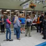 Juneau residents line up outside of the Planet Alaska Gallery to sign an application petition to recall Gov. Mike Dunleavy on Thursday, Aug. 1, 2019. (Michael Penn | Juneau Empire)
