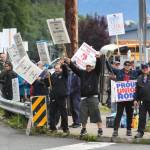 Members of the Inland Boatmens Union of the Pacific picket in front of the Auke Bay Terminal on Thursday, July 25, 2019. The union called a strike on Wednesday over failed negotiations with Gov. Mike Dunleavys administration. (Michael Penn | Juneau Empire)