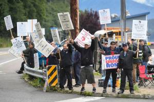 Members of the Inland Boatmens Union of the Pacific picket in front of the Auke Bay Terminal on Thursday, July 25, 2019. The union called a strike on Wednesday over failed negotiations with Gov. Mike Dunleavys administration. (Michael Penn | Juneau Empire)