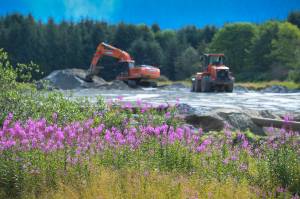 Construction work on land owned by Bicknell, Inc., at Honsinger Pond also known as the Field of Fireweed on Monday, July 22, 2019. Right now, work is focused on a 16-acre portion of a roughly 50-acre parcel. (Michael Penn | Juneau Empire)