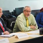 Doug Vincent-Lang, Commissioner of the Alaska Department of Fish and Game, center, speaks during a roundtable meeting on Alaska-British Columbia Transboundary mining at the Federal Building in Juneau on Monday, Aug. 5, 2019. Corri Feige, Commissioner of the Alaska Department of Natural Resources, right, and Jason Brune, Commissioner of the Alaska Department of Environmental Conservation, listen. (Michael Penn | Juneau Empire)
