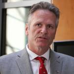 Alaska Gov. Mike Dunleavy speaks at a news conference Monday, Aug. 5, 2019, in Anchorage, Alaska. State health department officials discussed proposals they are seeking for a study on the feasibility of privatizing Alaskas state-owned psychiatric hospital and announced the Alaska Psychiatric Institute is in good standing with federal requirements. (AP Photo/Mark Thiessen)