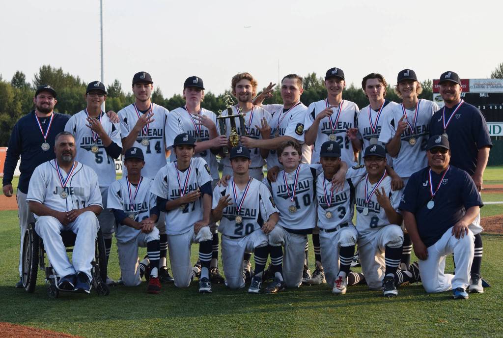 The Juneau Post 25 Midnight Suns celebrate winning their third consecutive state championship after defeating Wasilla 13-8 in the state title game on Tuesday, July 30, 2019, at Mulcahy Stadium in Anchorage. Juneau plays in the Northwest Regional Tournament starting Wednesday in Lewiston, Idaho. (Nolin Ainsworth | Juneau Empire)