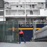 The Alaska Marine Highway System employee opens the vehicle gate after the Tazlina arrives at the Auke Bay Terminal on Wednesday, July 24, 2019. (Michael Penn | Juneau Empire)