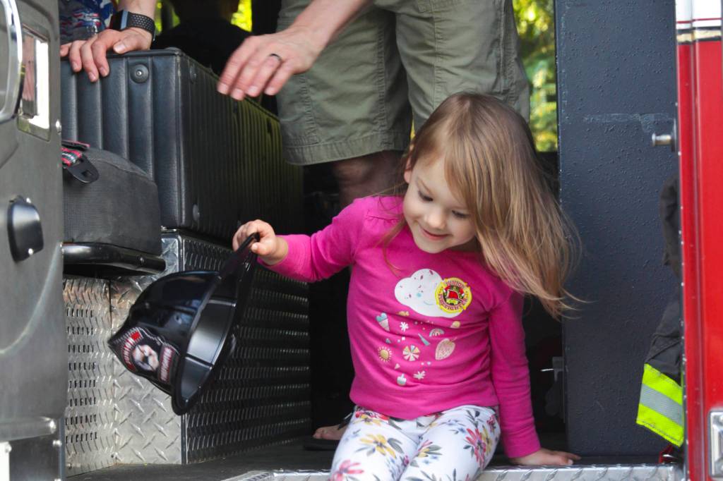 The Juneau Police Department organized participation in the National Night Out for all Juneau public services, including Capital City Fire/Rescue, the Alaska State Troopers, and other uniformed and nonuniformed public services, Aug. 6, 2019. (Michael S. Lockett | Juneau Empire)