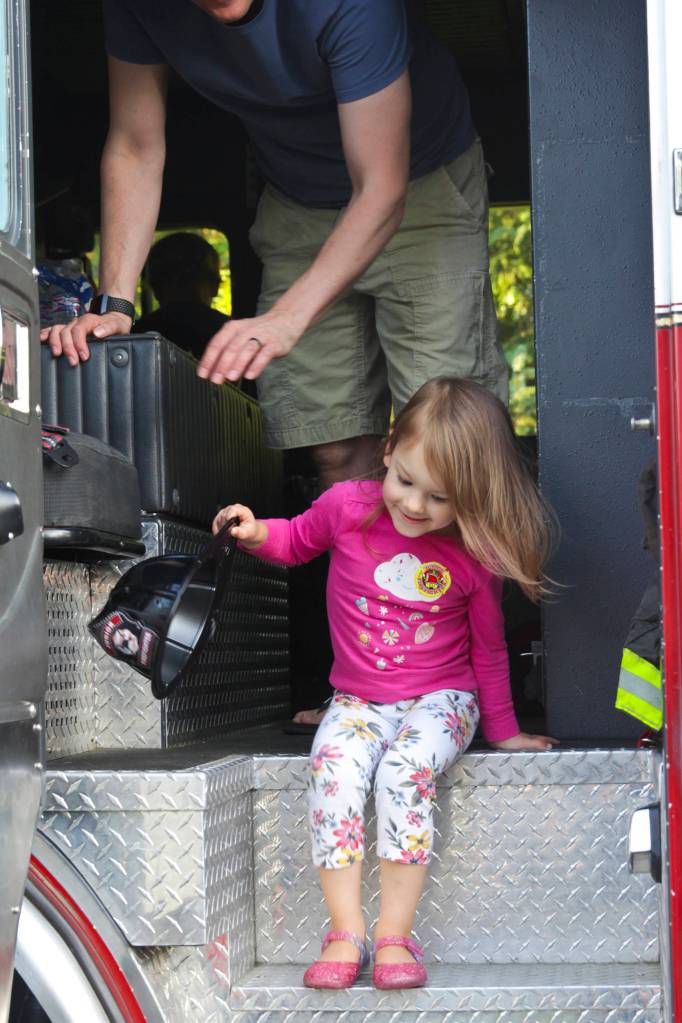 The Juneau Police Department organized participation in the National Night Out for all Juneau public services, including Capital City Fire/Rescue, the Alaska State Troopers, and other uniformed and nonuniformed public services, Aug. 6, 2019. (Michael S. Lockett | Juneau Empire)