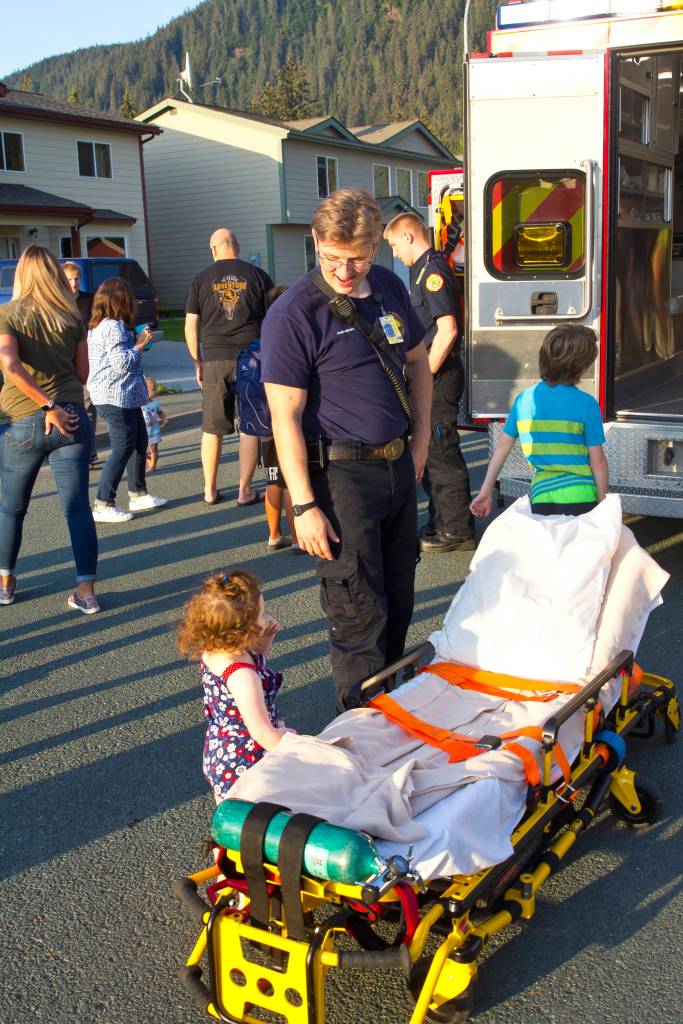 The Juneau Police Department organized participation in the National Night Out for all Juneau public services, including Capital City Fire/Rescue, the Alaska State Troopers, and other uniformed and nonuniformed public services, Aug. 6, 2019. (Michael S. Lockett | Juneau Empire)
