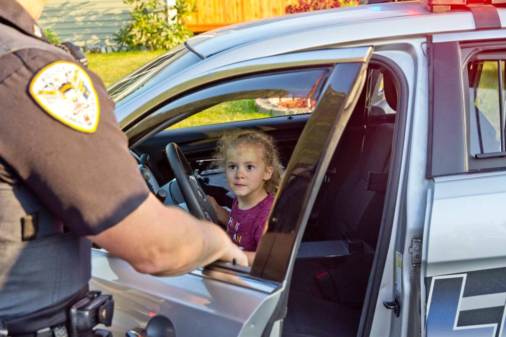 The Juneau Police Department organized participation in the National Night Out for all Juneau public services, including Capital City Fire/Rescue, the Alaska State Troopers, and other uniformed and nonuniformed public services, Aug. 6, 2019. (Michael S. Lockett | Juneau Empire)