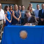 Gov. Mike Dunleavy at the signing ceremony at the Alaska Association of General Contractors in Anchorage on August 8, 2019 (Courtesy photo)