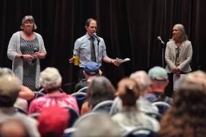 Sen. Jesse Kiehl, D-Juneau, center, speaks during a town hall meeting with Rep. Sara Hannan, D-Juneau, left, and Rep. Andi Story, D-Juneau, at Centennial Hall on Thursday, Aug. 8, 2019. (Michael Penn | Juneau Empire)