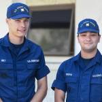 Seamen Logan Holt, left, and Daniel Piscoya pose outside of U.S. Coast Guard Station Juneau on Friday, Aug. 9, 2019. Both are taking advantage of the Coast Guards College Student Pre-Commissioning Initiative program and have recently returned from basic training. (Michael Penn | Juneau Empire)