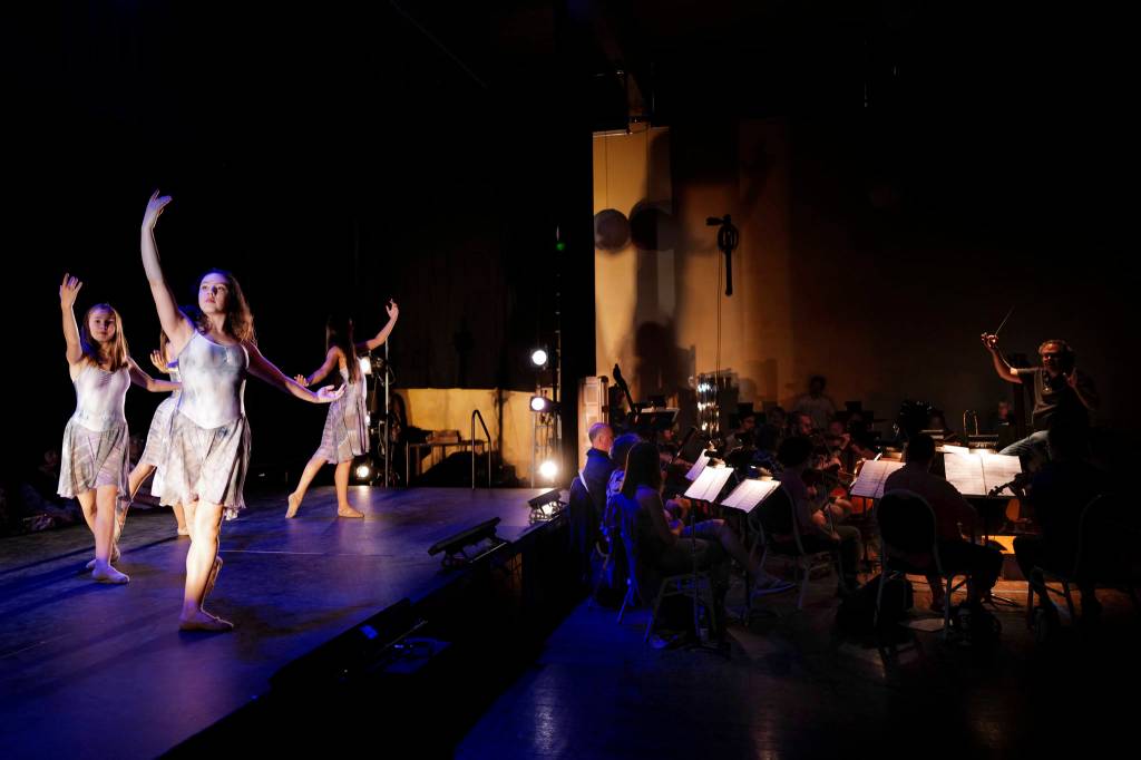 Dancers take to the stage as the Juneau Lyric Opera rehearses Composer Pietro Mascagnis Cavalleria Rusticana at the Juneau Arts and Culture Center on Monday, Aug. 12, 2019. (Michael Penn | Juneau Empire)
