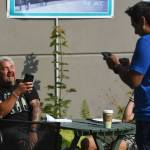 Guy Fieri, host of Diners, Drive-Ins and Dives, reacts while in front of the Juneau Arts & Culture Center on Tuesday, Aug. 13, 2019. Fieri has been seen filming at Pucker Wilsons, Bun Daddy, Forno Rosso Pizzeria, Zereldas Bistro and In Bocca Al Lupo. (Michael Penn | Juneau Empire)