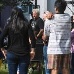 Guy Fieri, host of Diners, Drive-Ins and Dives, in front of the Juneau Arts & Culture Center on Tuesday, Aug. 13, 2019. Fieri has been seen filming at Pucker Wilsons, Bun Daddy, Forno Rosso Pizzeria, Zereldas Bistro and In Bocca Al Lupo. (Michael Penn | Juneau Empire)