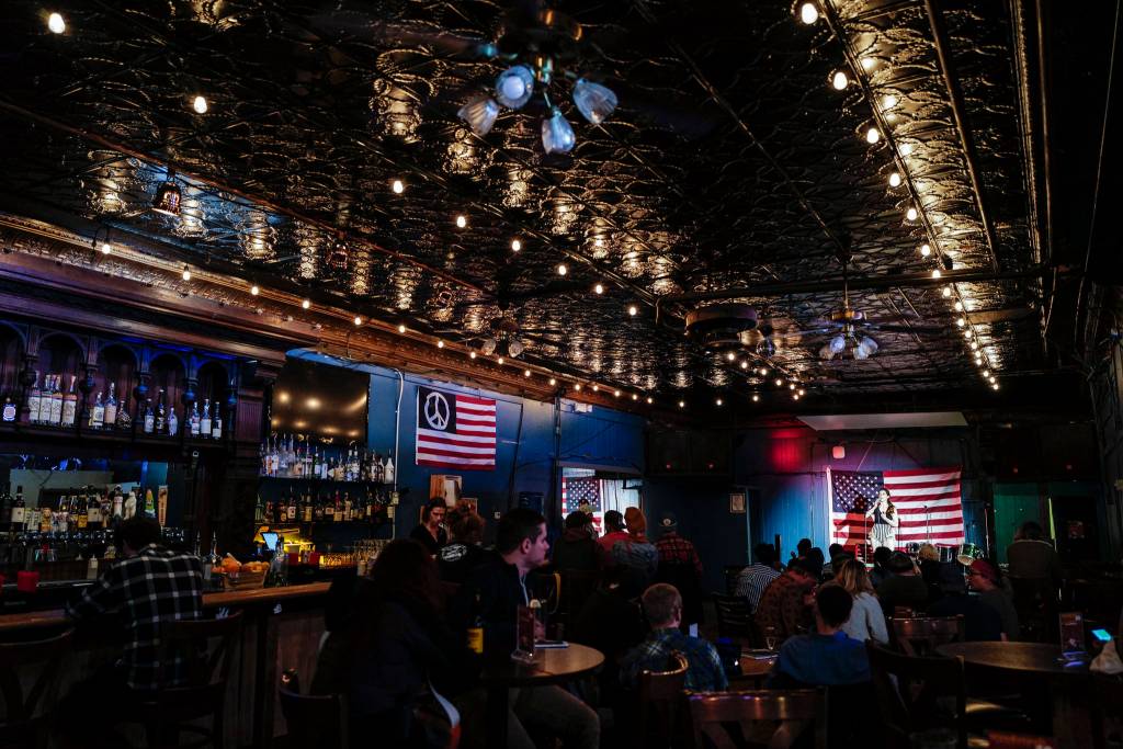 Erika Bergren hosts the GRLZ open mic night at the The Rendezvous Bar on Wednesday, Aug. 14, 2019. (Michael Penn | Juneau Empire)