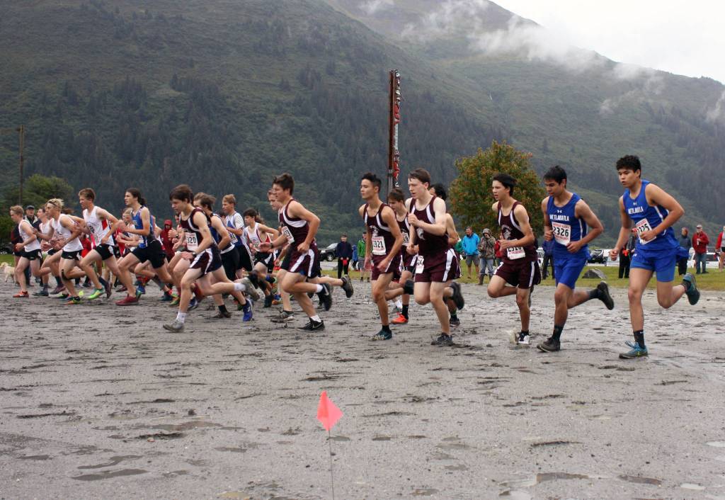 The Juneau-Douglas, Thunder Mountain, Ketchikan and Metlakatla boys cross country teams begin the Douglas Island Mini-Meet on Saturday, Aug. 17, 2019. (Nolin Ainsworth | Juneau Empire)