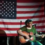 Emily Mesch performs during the GRLZ open mic night at the The Rendezvous Bar on Wednesday, Aug. 14, 2019. (Michael Penn | Juneau Empire)