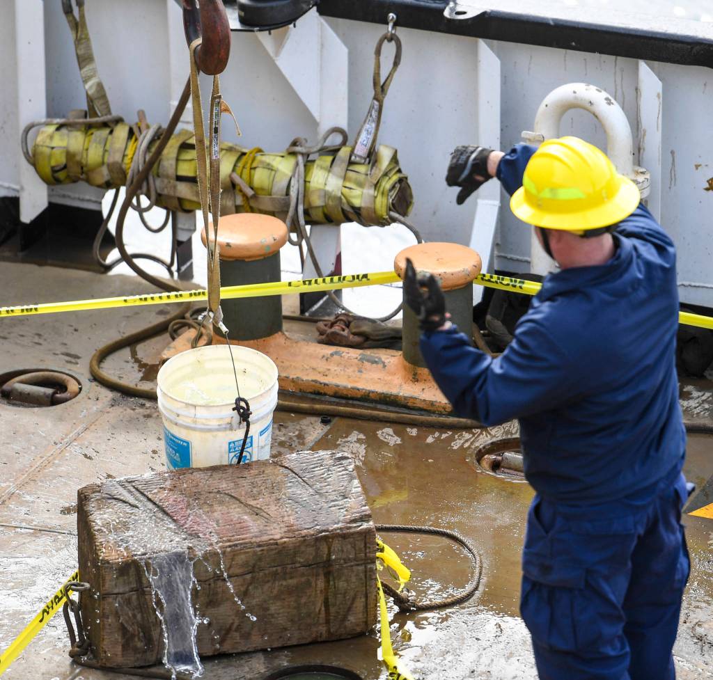 Members of the U.S. Coast Guard, U.S.C.G Dive Team, U.S. Army Dive Team and the Canadian Coast Guard participate in the annual Buoy Tender Olympics at Station Juneau on Wednesday, Aug. 21, 2019. (Michael Penn | Juneau Empire)