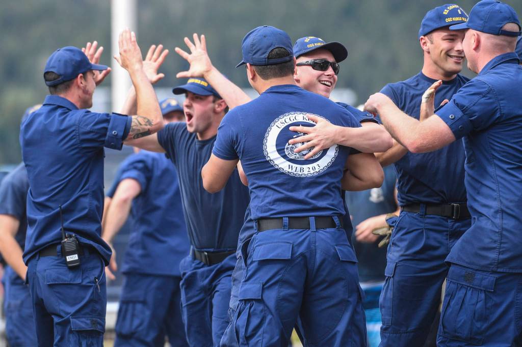 Members of the U.S. Coast Guard, U.S.C.G Dive Team, U.S. Army Dive Team and the Canadian Coast Guard participate in the annual Buoy Tender Olympics at Station Juneau on Wednesday, Aug. 21, 2019. (Michael Penn | Juneau Empire)