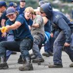 Members of the U.S. Coast Guard, U.S.C.G Dive Team, U.S. Army Dive Team and the Canadian Coast Guard participate in the annual Buoy Tender Olympics at Station Juneau on Wednesday, Aug. 21, 2019. (Michael Penn | Juneau Empire)