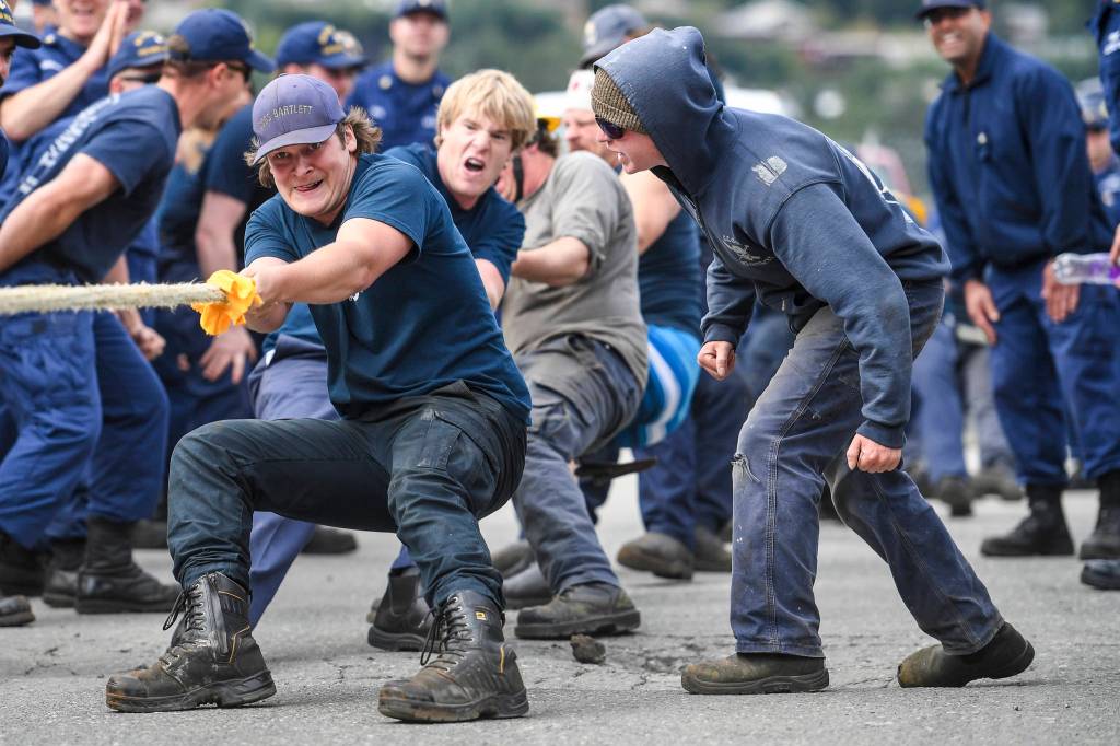 Members of the U.S. Coast Guard, U.S.C.G Dive Team, U.S. Army Dive Team and the Canadian Coast Guard participate in the annual Buoy Tender Olympics at Station Juneau on Wednesday, Aug. 21, 2019. (Michael Penn | Juneau Empire)