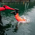 Members of the U.S. Coast Guard, U.S.C.G Dive Team, U.S. Army Dive Team and the Canadian Coast Guard participate in the annual Buoy Tender Olympics at Station Juneau on Wednesday, Aug. 21, 2019. (Michael Penn | Juneau Empire)