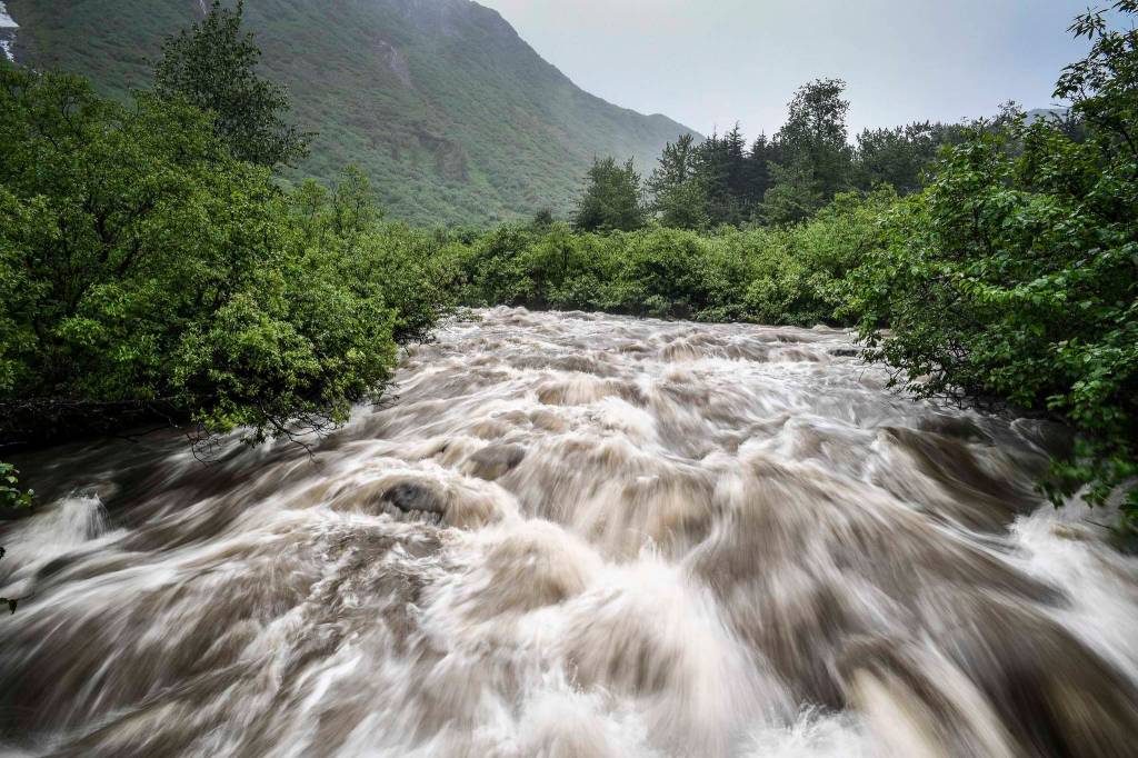 Heavy rainfall swells Gold Creek along Perseverance Trail on Tuesday, June 11, 2019. (Michael Penn | Juneau Empire)
