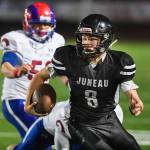 Juneaus Noah Chambers scrambles against Antelope Union in the third quarter at Adair-Kennedy Memorial Field on Saturday, Aug. 24, 2019. Juneau won 56-18. (Michael Penn | Juneau Empire)
