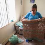Star White displays a sleeping mat she crocheted for Juneaus homeless using 467 plastic grocery bags on Thursday, Aug. 29, 2019. (Michael Penn | Juneau Empire)